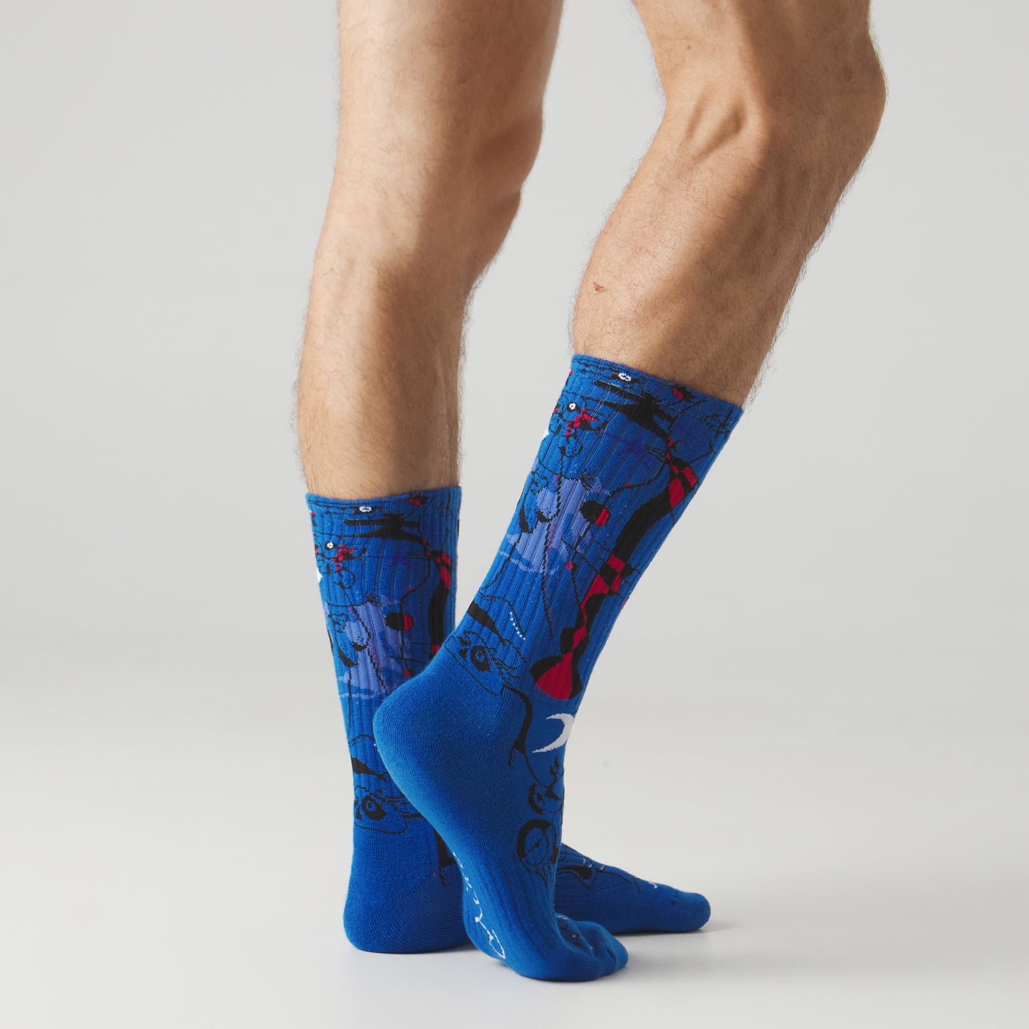 Athletic Miró Figures at Night - Azul